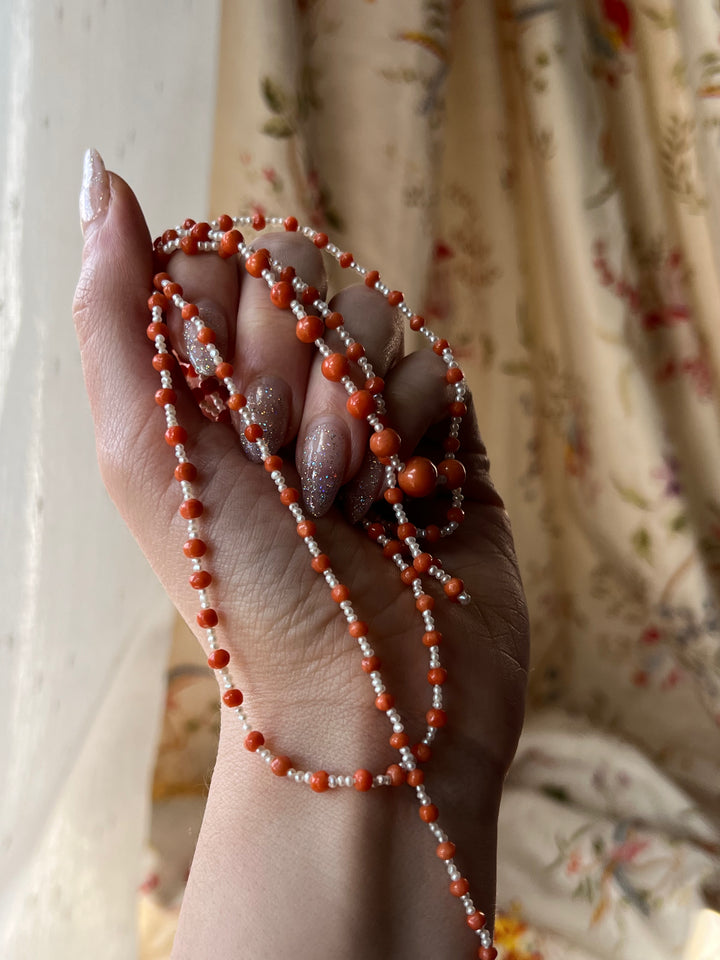 42” Pearl and Coral Long Guard Strand