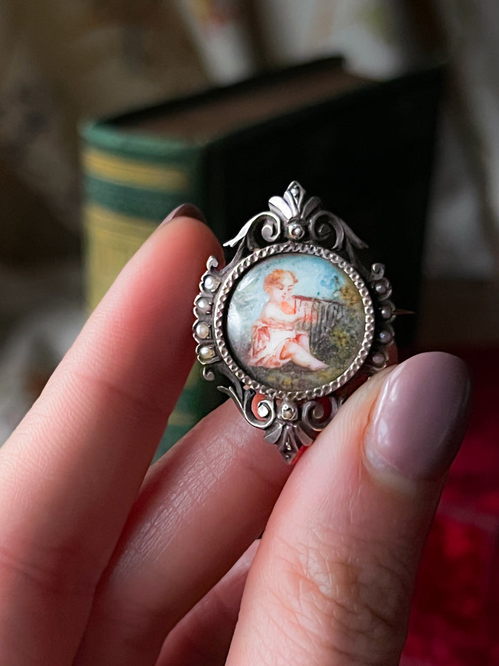 19th C French Brooch of Cherub and his Lyre