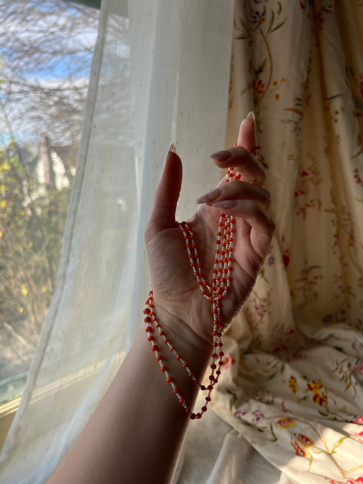 42” Pearl and Coral Long Guard Strand