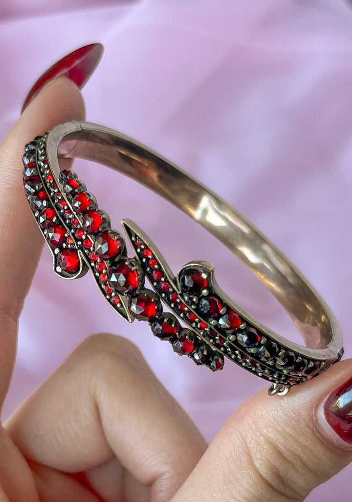 Outstanding Garnet Swirl Bangle Bracelet, circa 1890