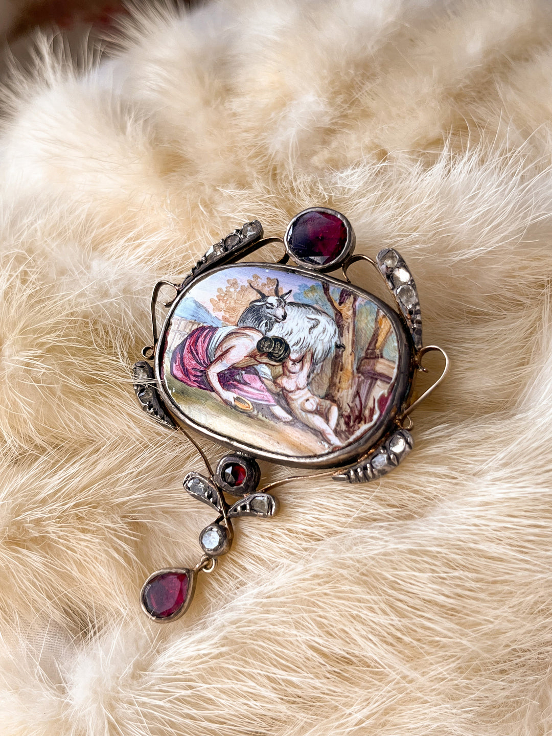 Porcelain Brooch Miniature of Zeus and Almatheia In Crete With Garnets and Diamonds