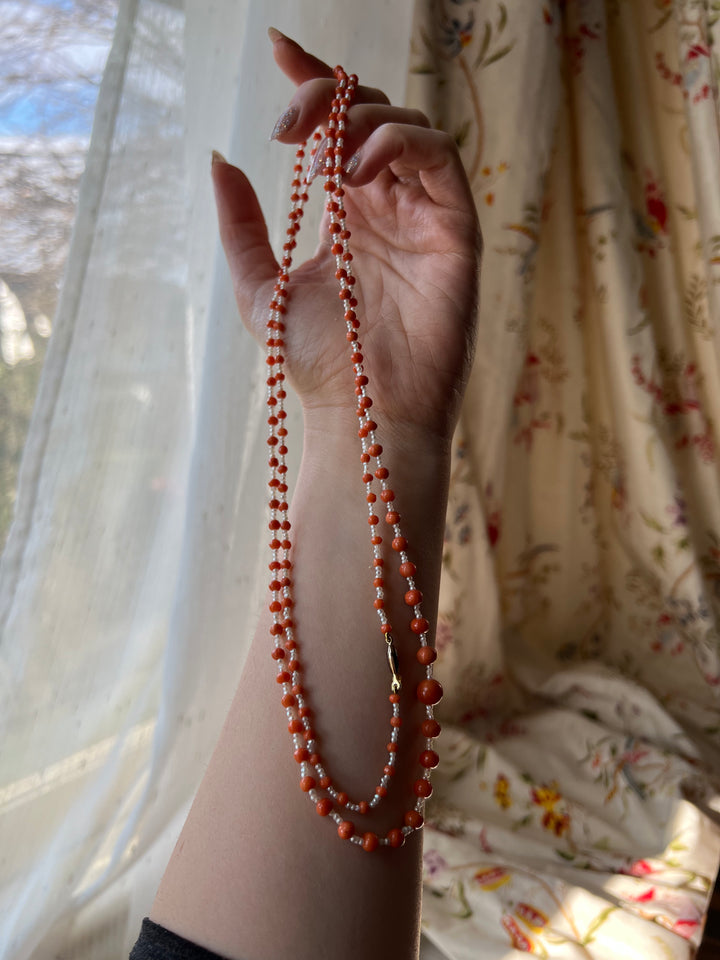 42” Pearl and Coral Long Guard Strand