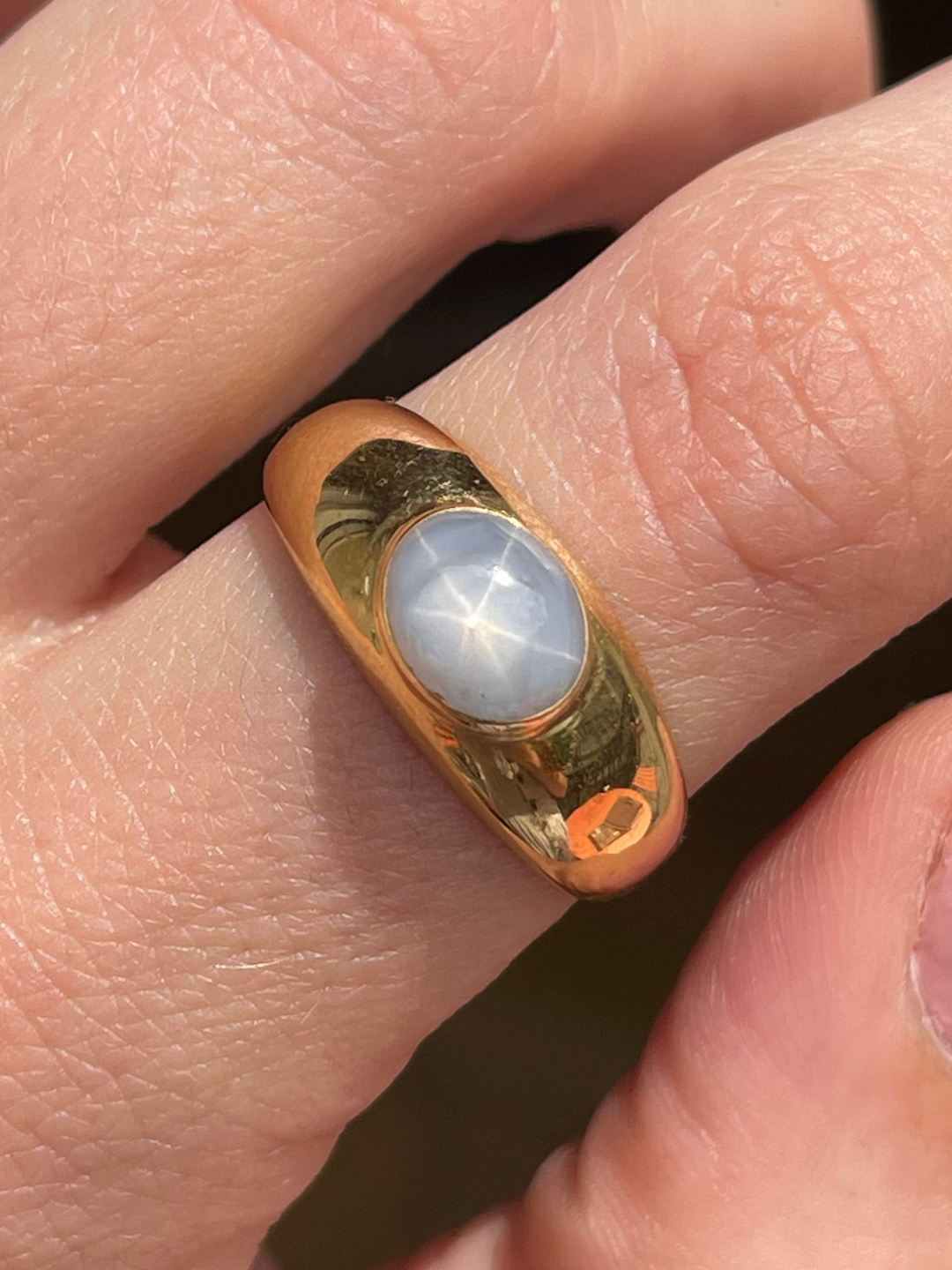 Close up of dove grey star sapphire no heat star sapphire 18ct star sapphire stacking band star sapphire