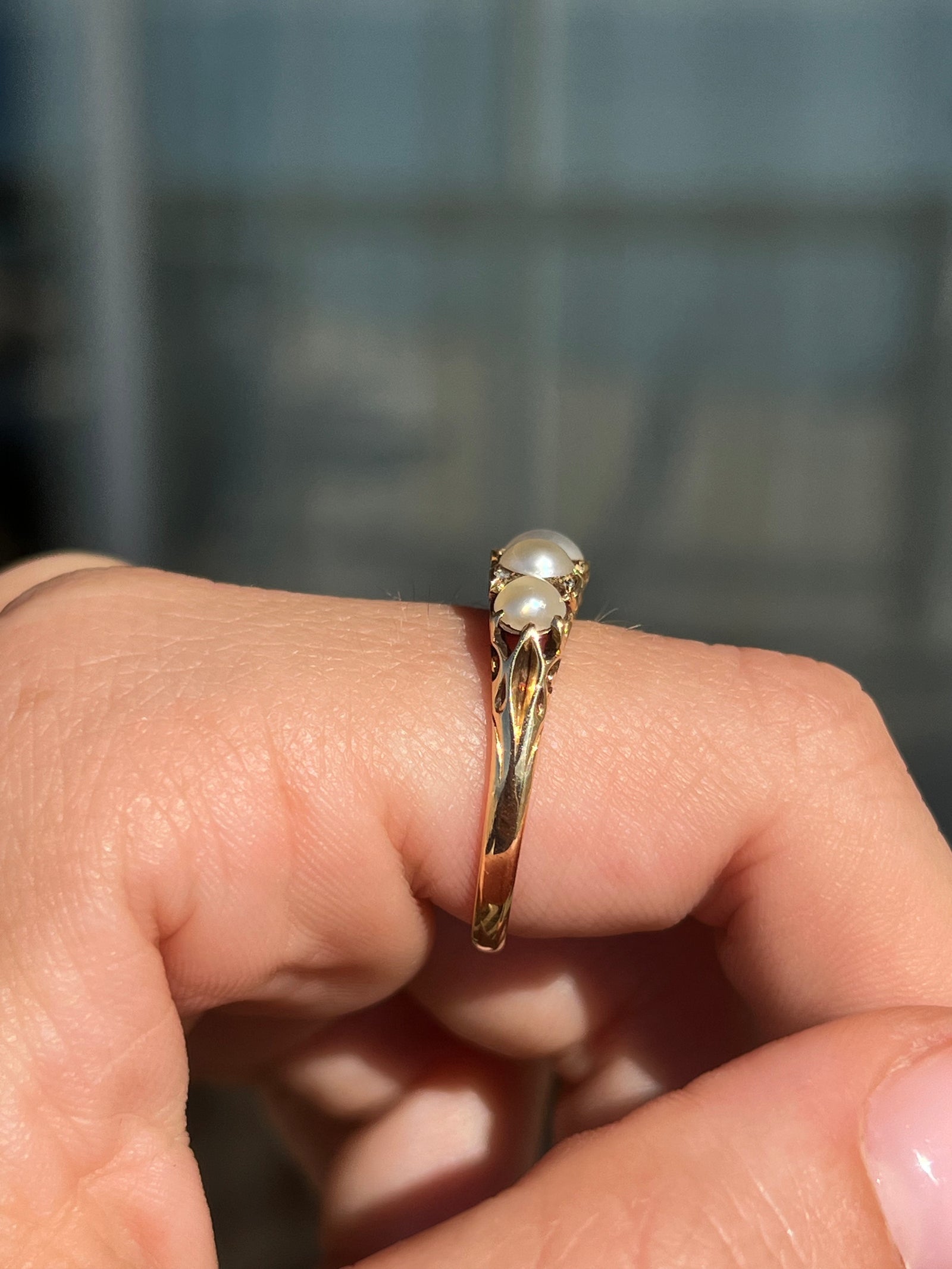 Victorian pearl and diamond band from circa 1890 with ornate fairytale-style gallery design