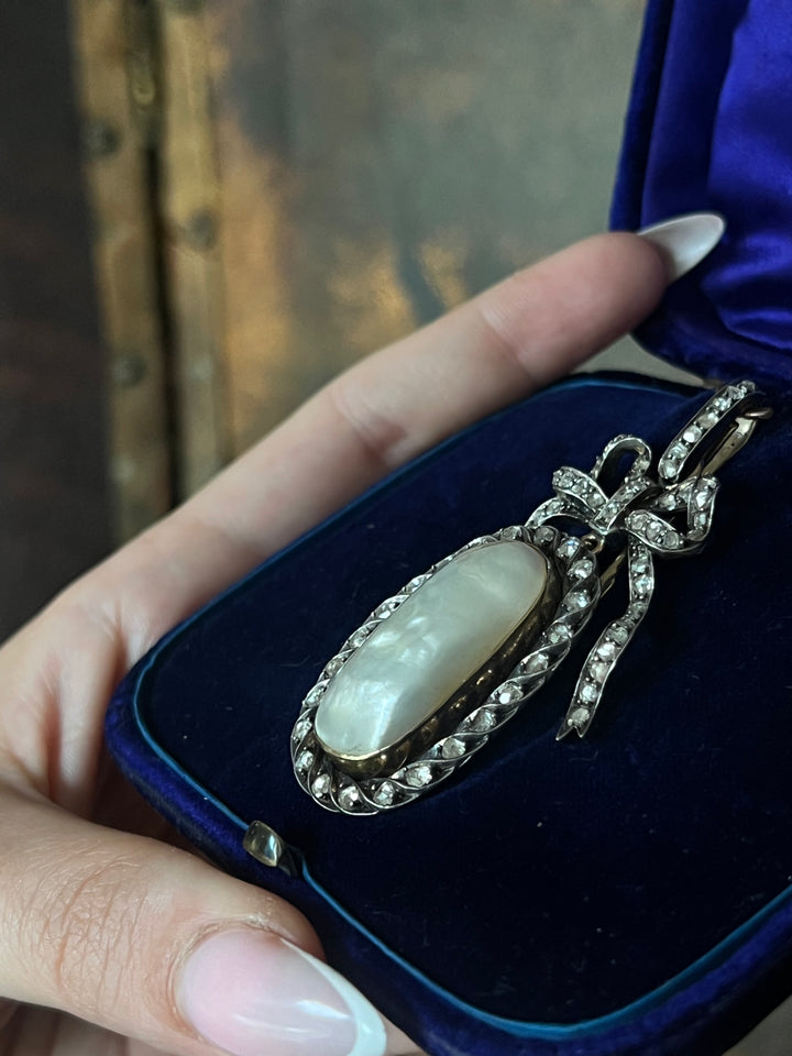 Diamond and Mother-of-Pearl Bow Pendant in Box C. 1905