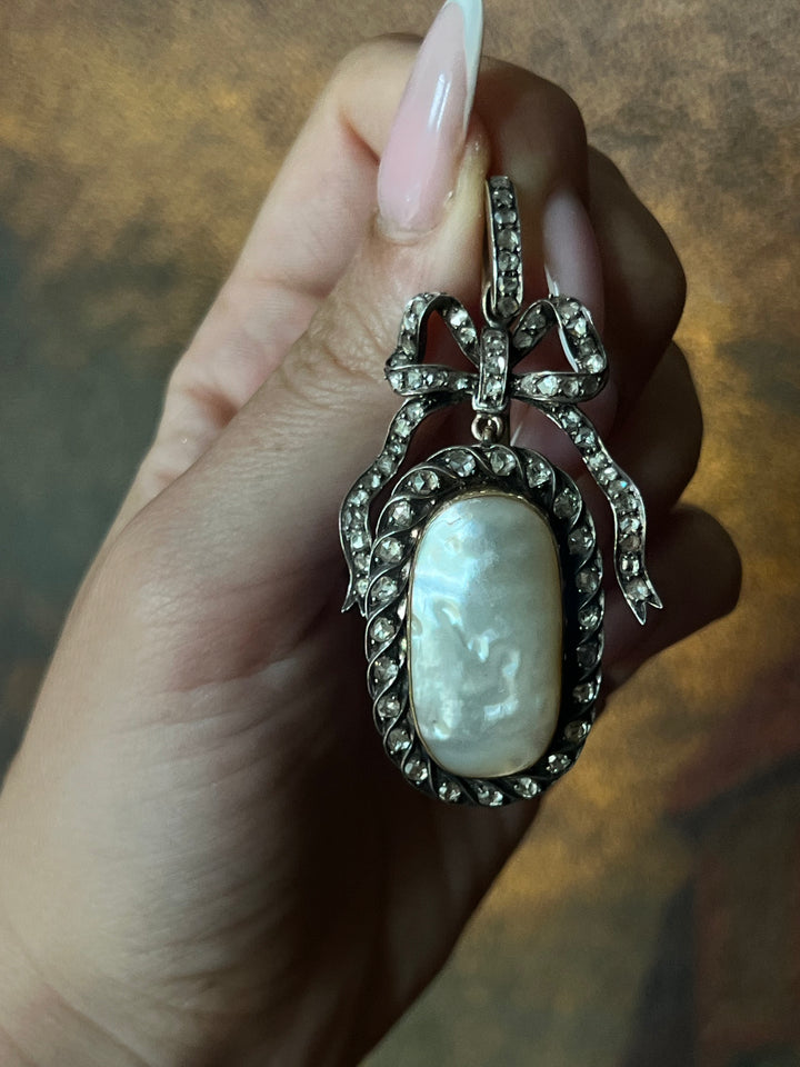 Diamond and Mother-of-Pearl Bow Pendant in Box C. 1905