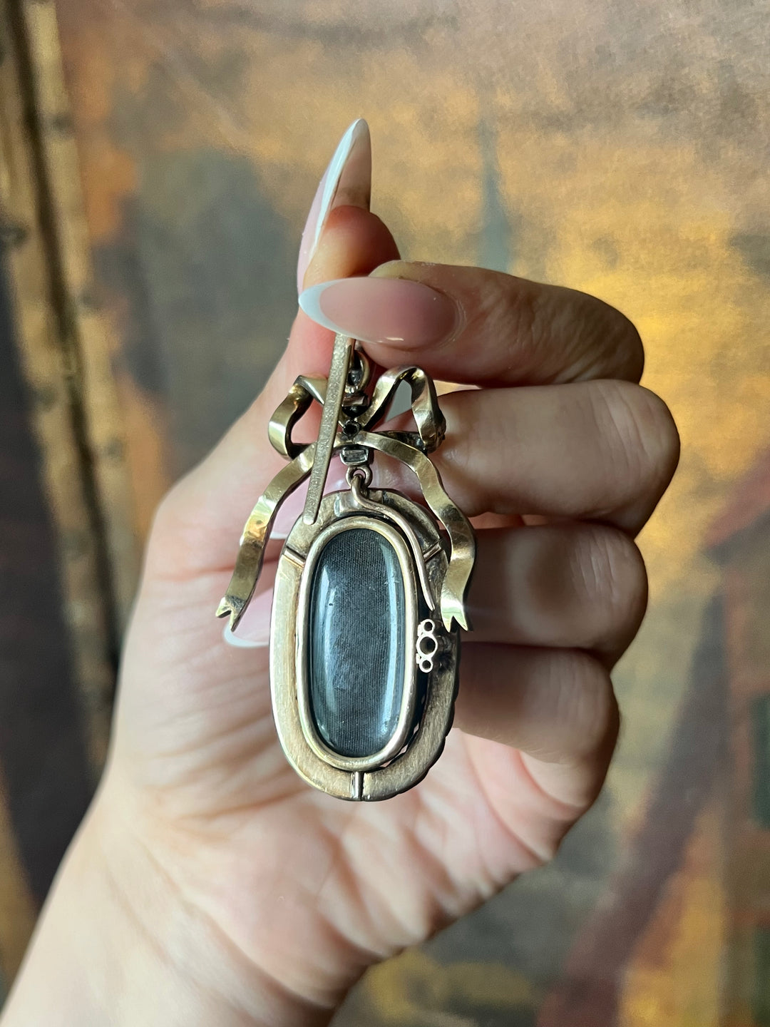 Diamond and Mother-of-Pearl Bow Pendant in Box C. 1905
