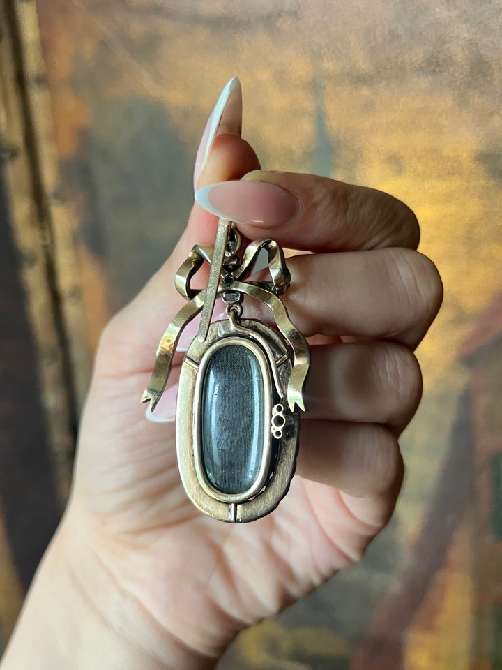Diamond and Mother-of-Pearl Bow Pendant in Box C. 1905