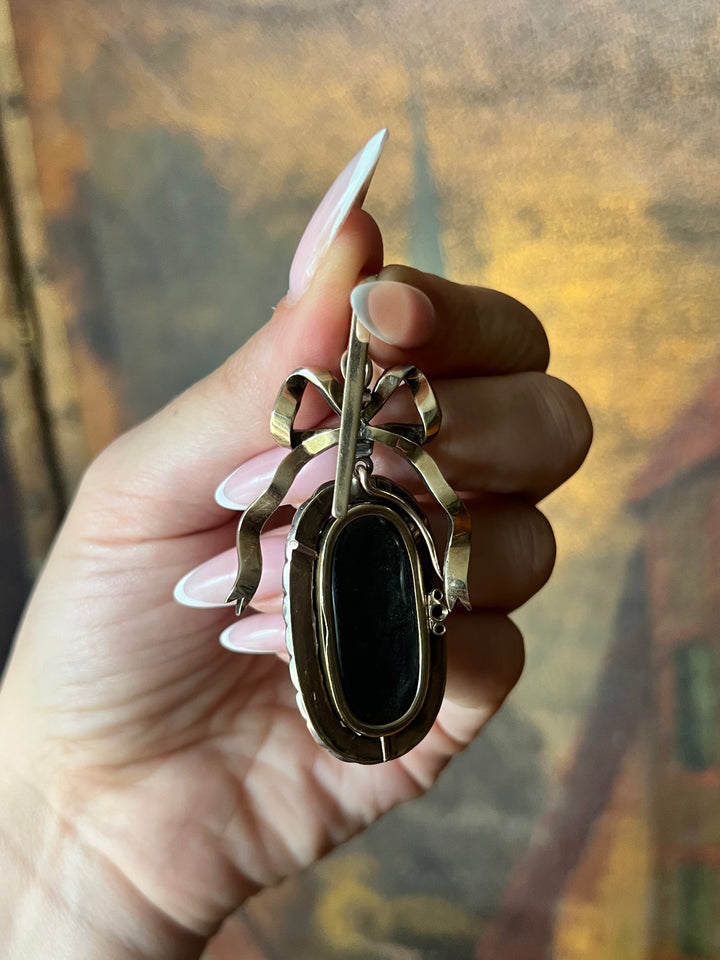 Diamond and Mother-of-Pearl Bow Pendant in Box C. 1905