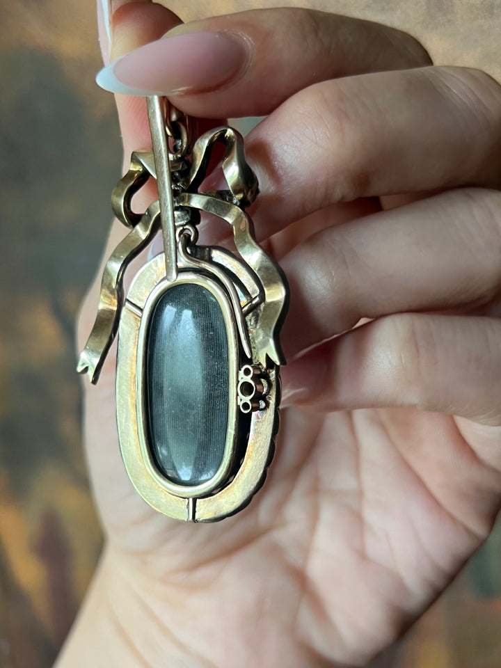 Diamond and Mother-of-Pearl Bow Pendant in Box C. 1905