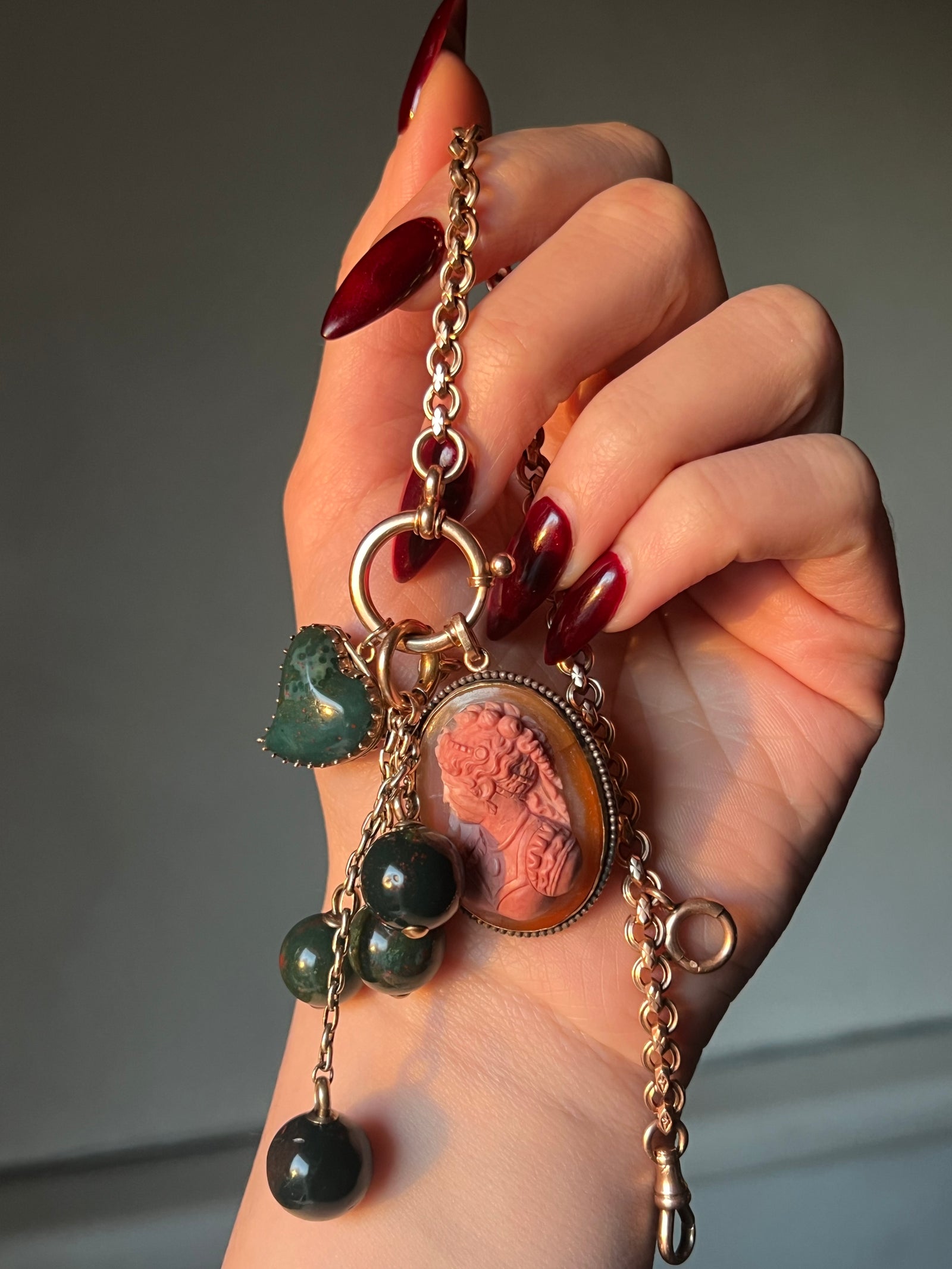 Victorian bloodstone boule cluster pendant from circa 1860 with rich green and red flecked stones
