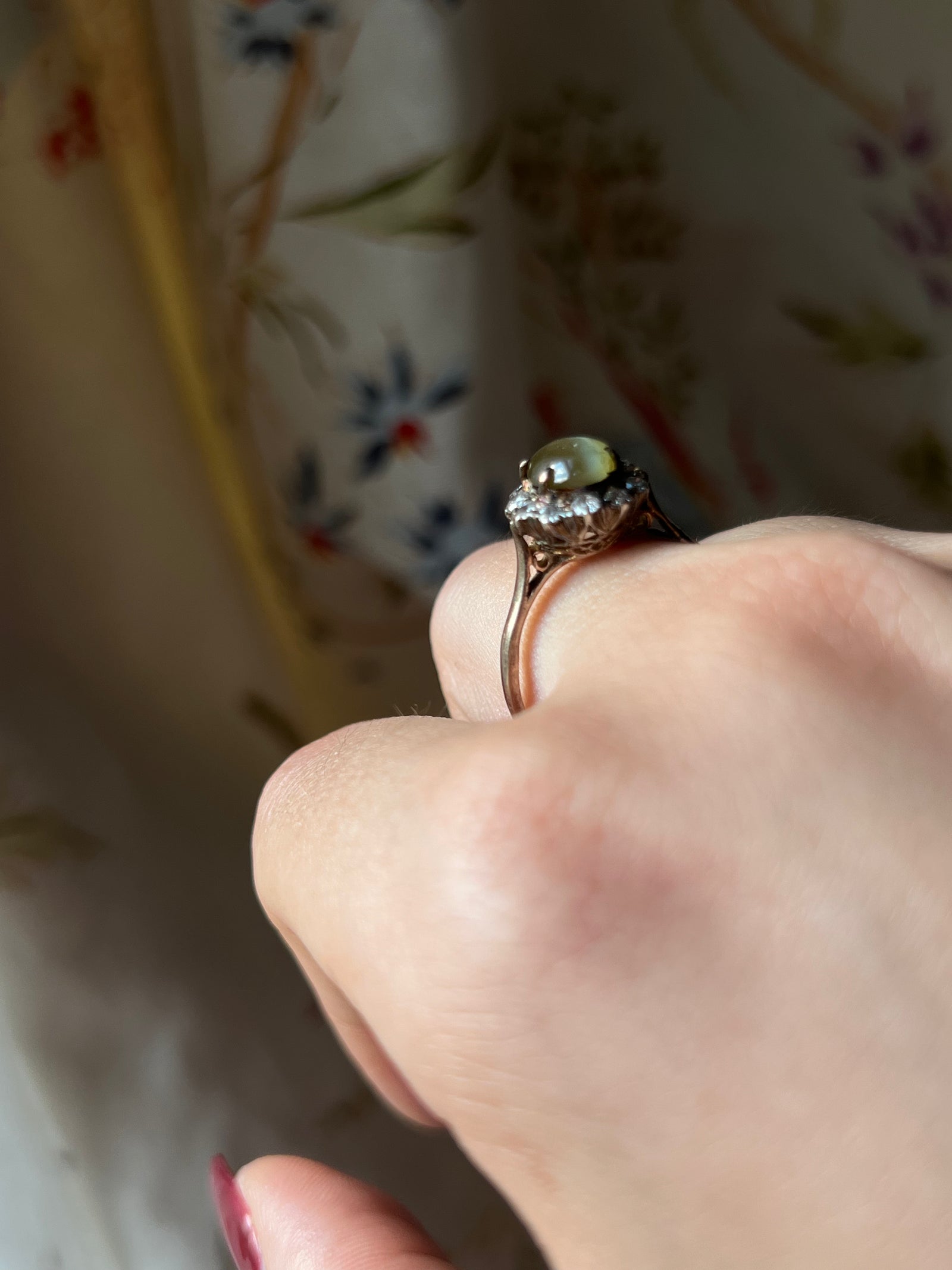 Early vintage cat’s eye chrysoberyl ring in antique gold setting with remarkable chatoyancy