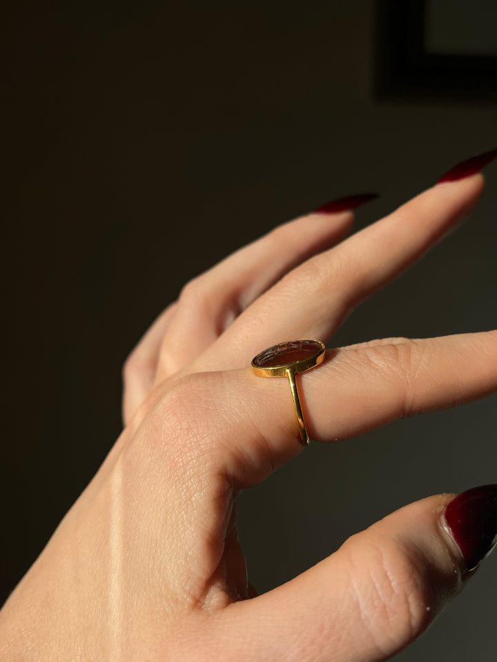 Superb 2nd Century CE Dark Carnelian Intaglio of Soldier Preparing for Battle in 18ct Ring