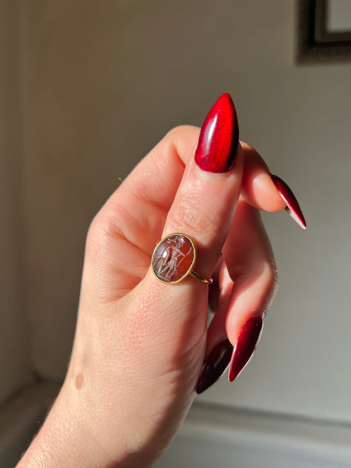 Superb 2nd Century CE Dark Carnelian Intaglio of Soldier Preparing for Battle in 18ct Ring