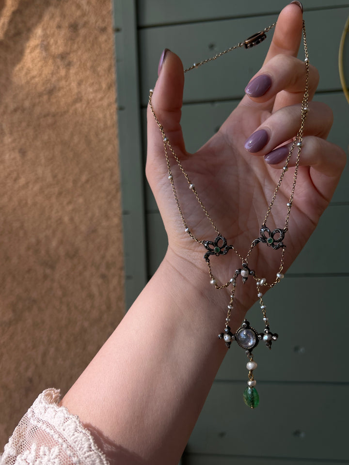 Early 20th C French Renaissance Revival Necklace in Sapphire, Emerald, Diamond, and Pearl with Bow Motifs