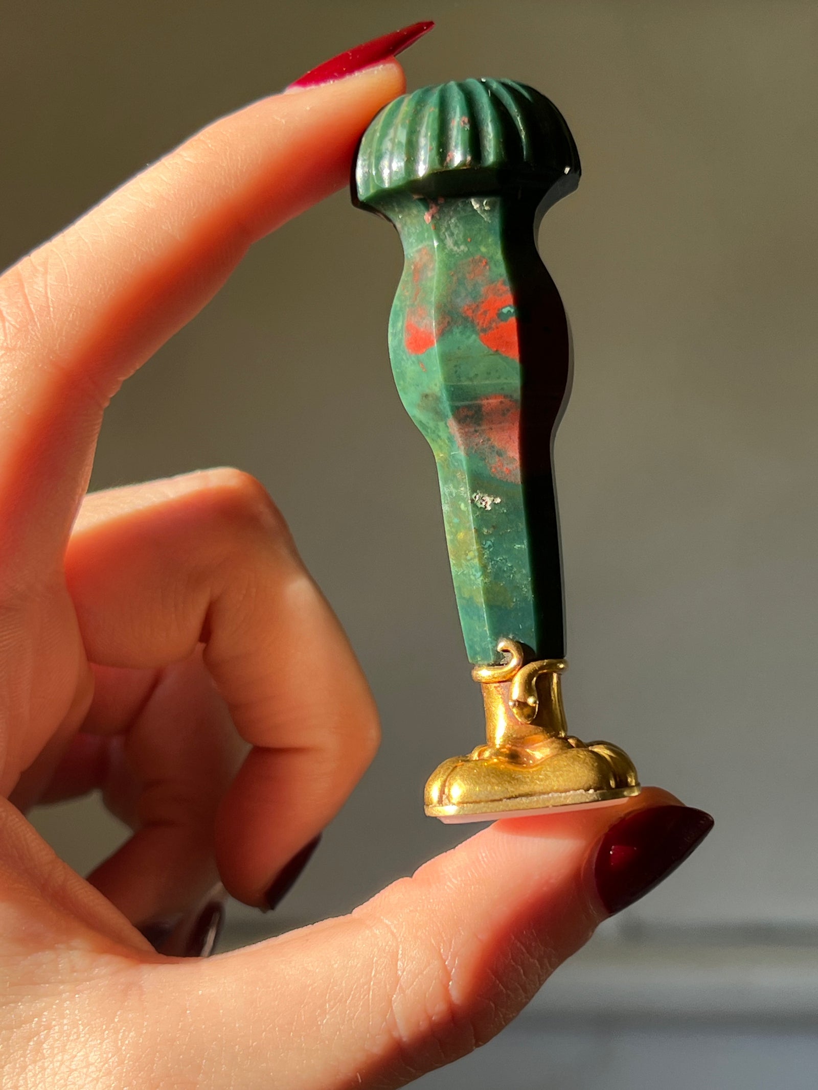 Antique bloodstone desk seal with 15ct gold snake embellishments and detailed handle design
