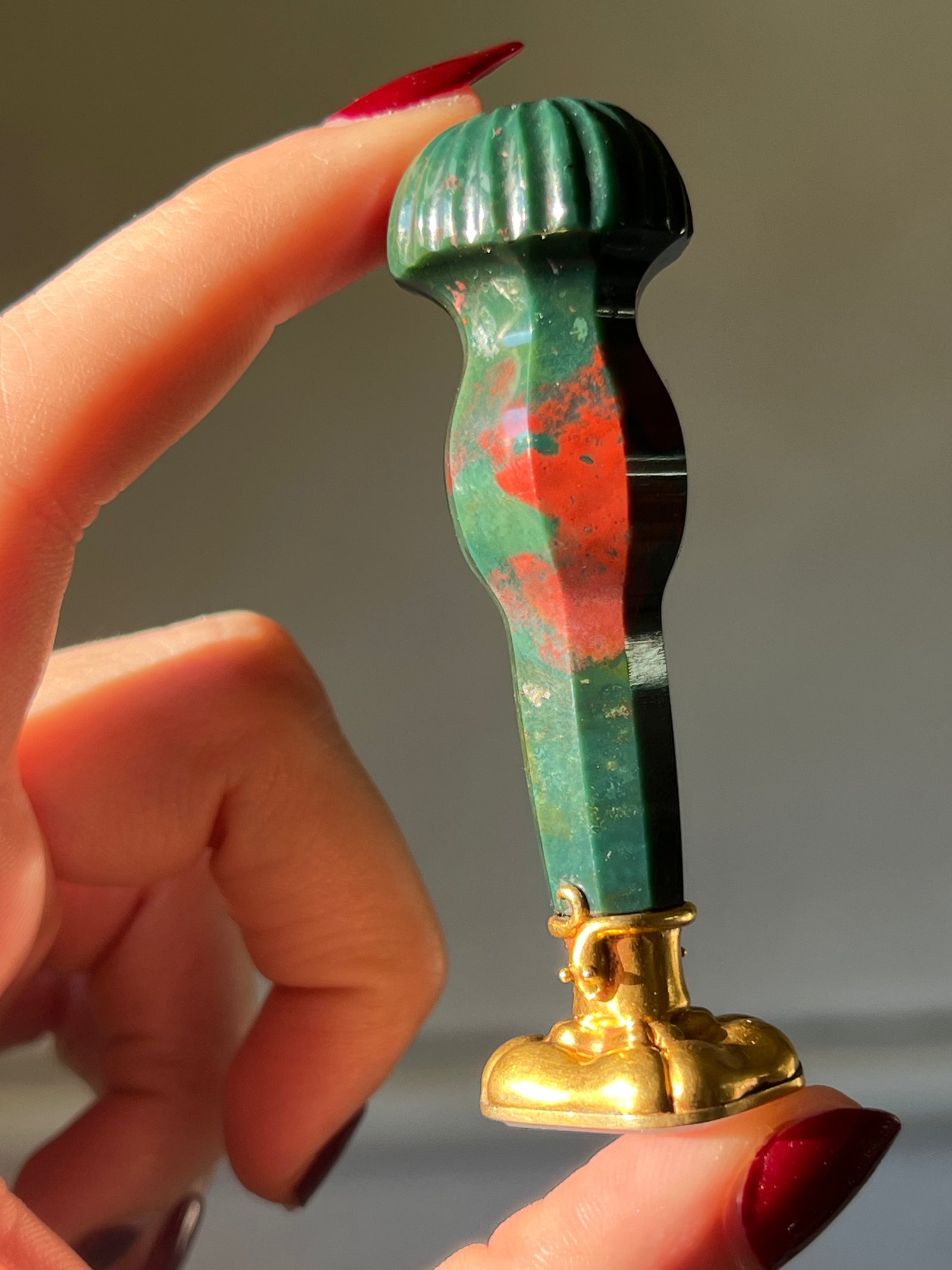 Antique bloodstone desk seal with 15ct gold snake embellishments and detailed handle design