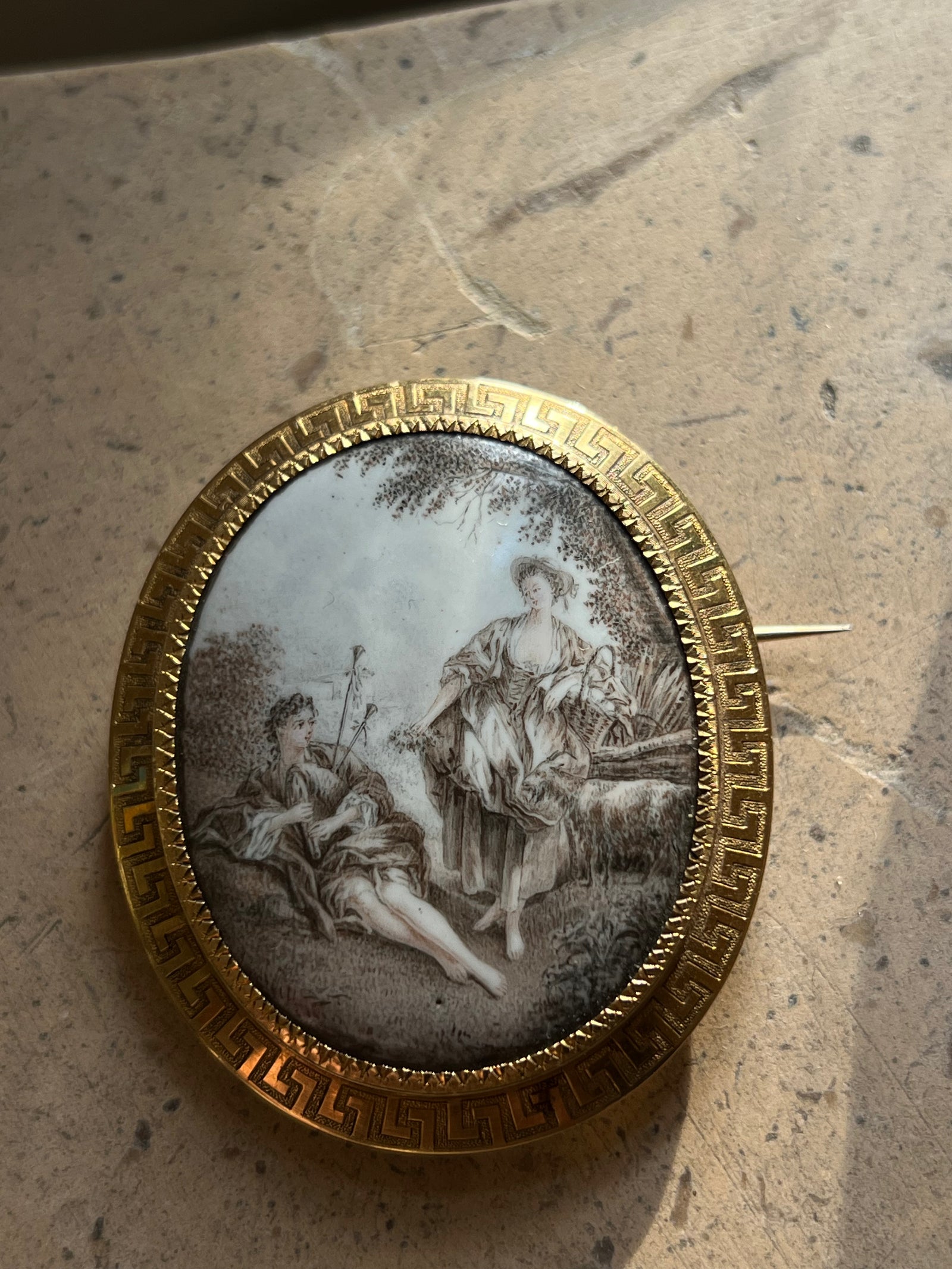 French pastoral enamel brooch in grisaille technique with detailed 19th-century scenic design