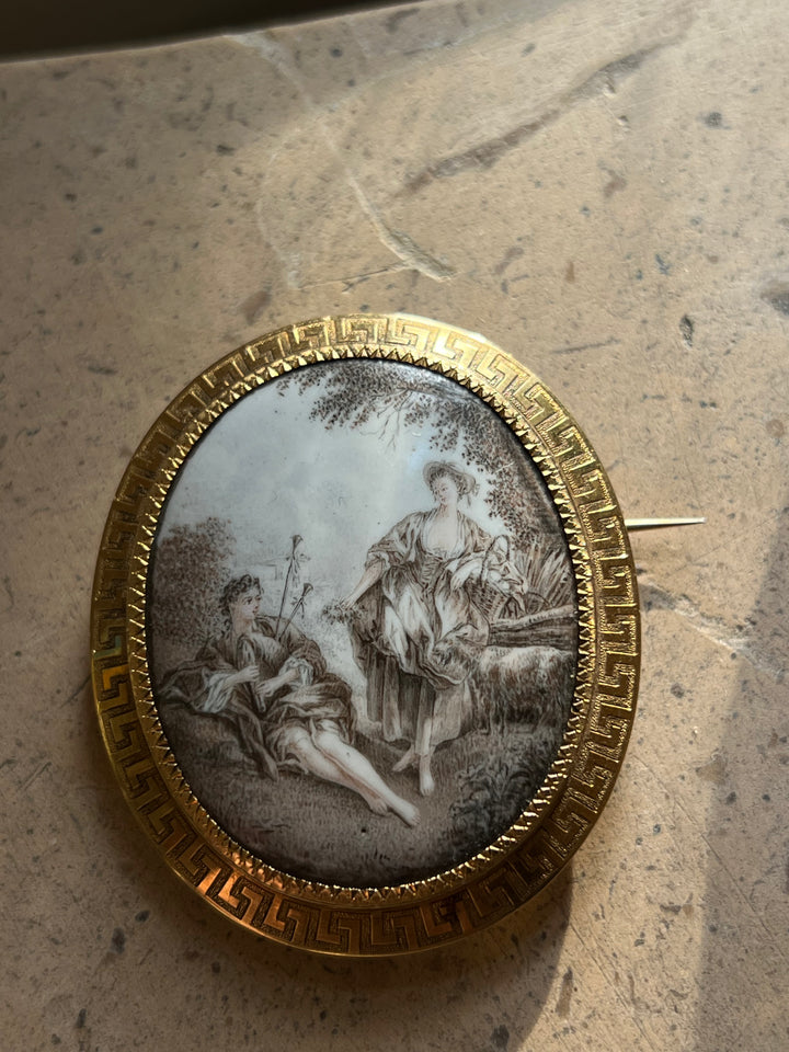 French pastoral enamel brooch in grisaille technique with detailed 19th-century scenic design