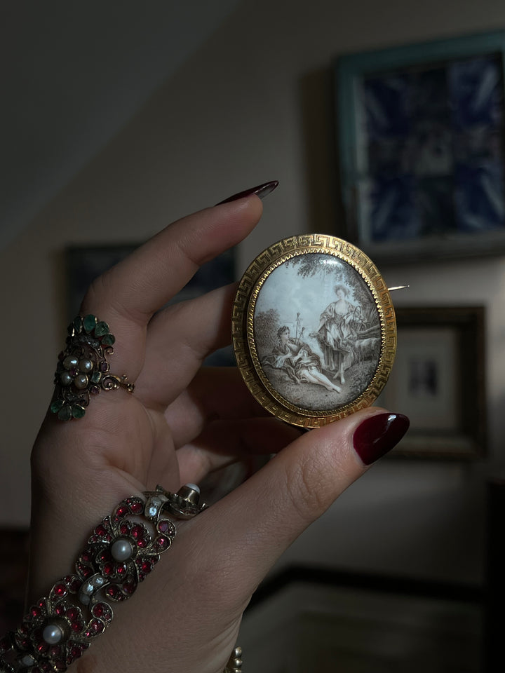 French pastoral enamel brooch in grisaille technique with detailed 19th-century scenic design