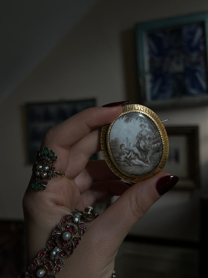 French pastoral enamel brooch in grisaille technique with detailed 19th-century scenic design