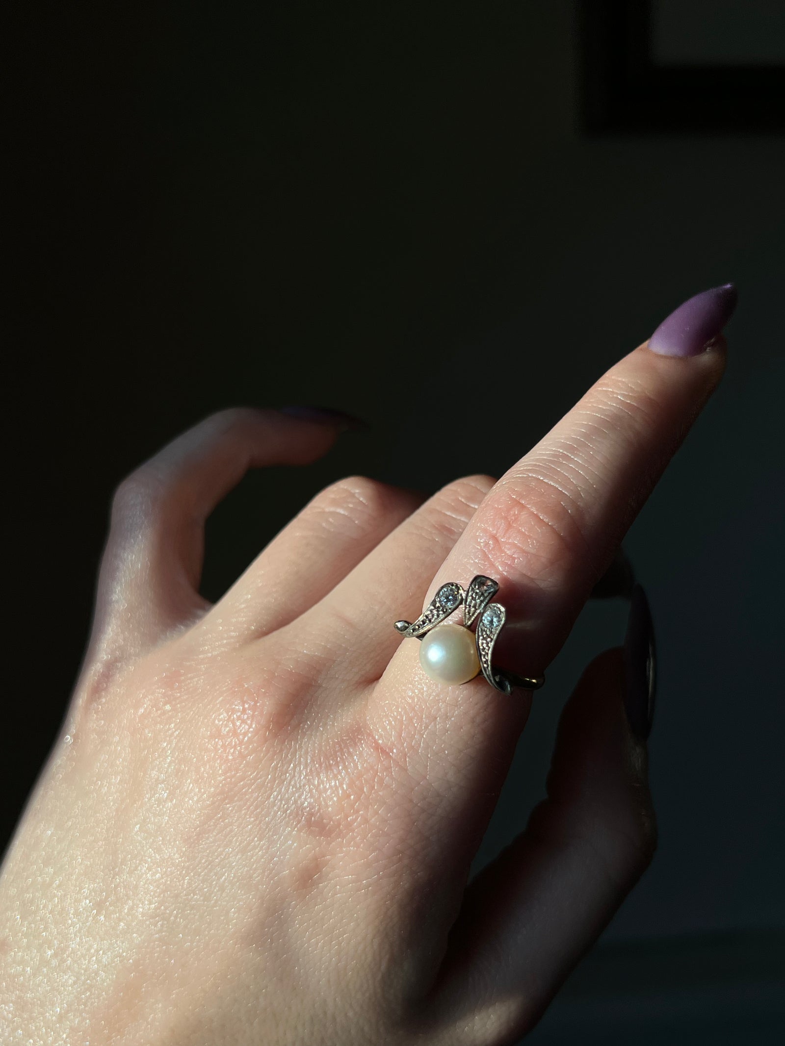 Elegant pearl and diamond waterfall ring with cascading vintage design