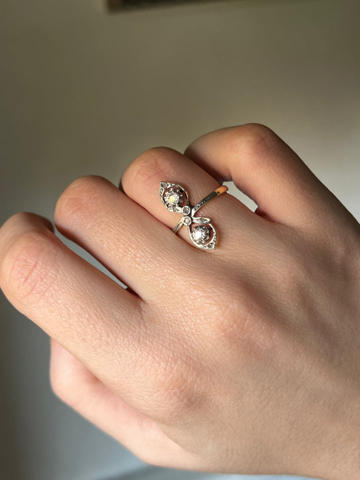 Belle Epoque Platinum and 18ct Figure 8 Navette Ring