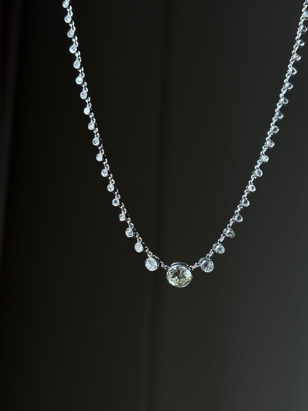 18ct White Gold Diamond Rivière with 2.16ct Old European-Cut Center, 7.73ctw