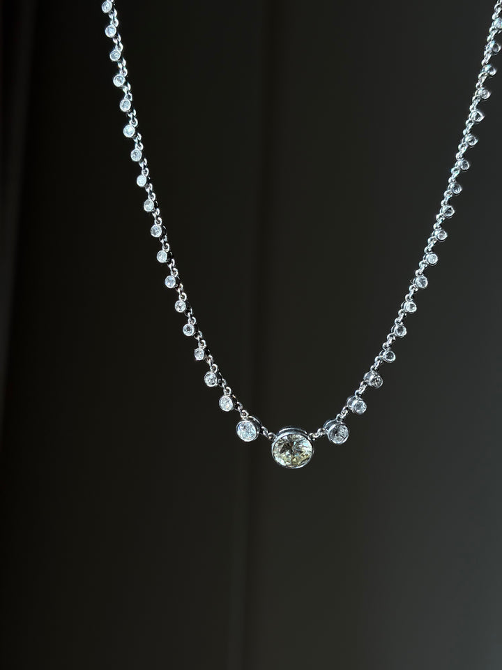 18ct White Gold Diamond Rivière with 2.16ct Old European-Cut Center, 7.73ctw