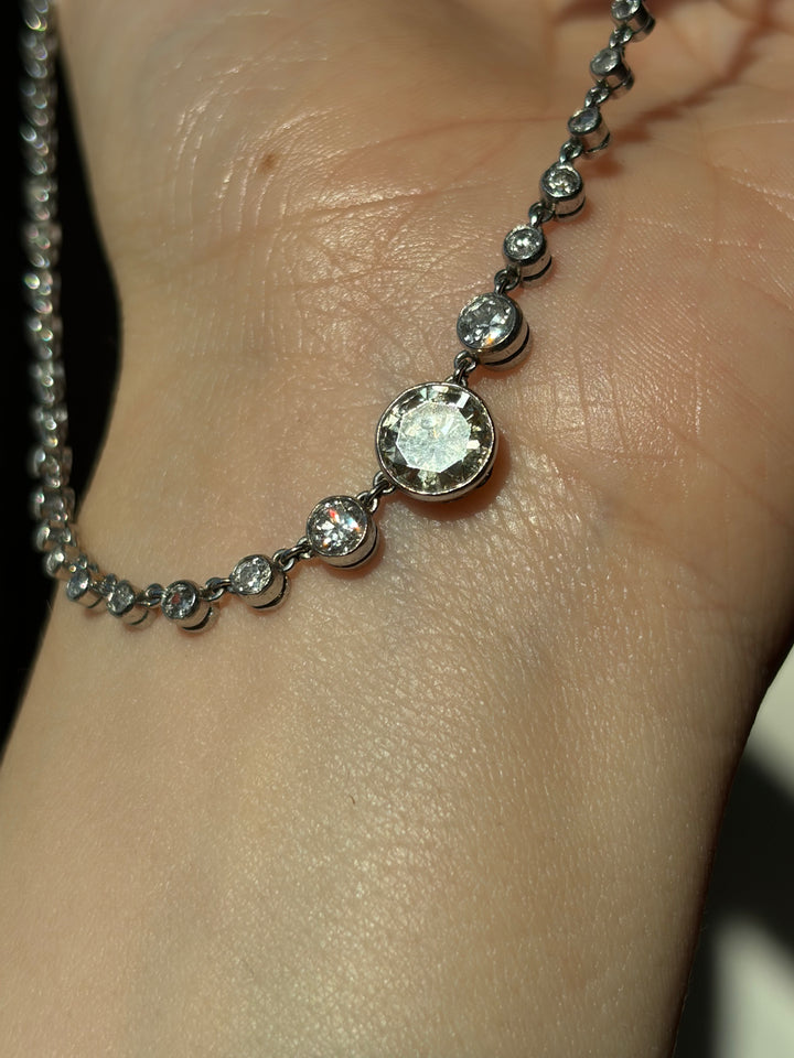 18ct White Gold Diamond Rivière with 2.16ct Old European-Cut Center, 7.73ctw