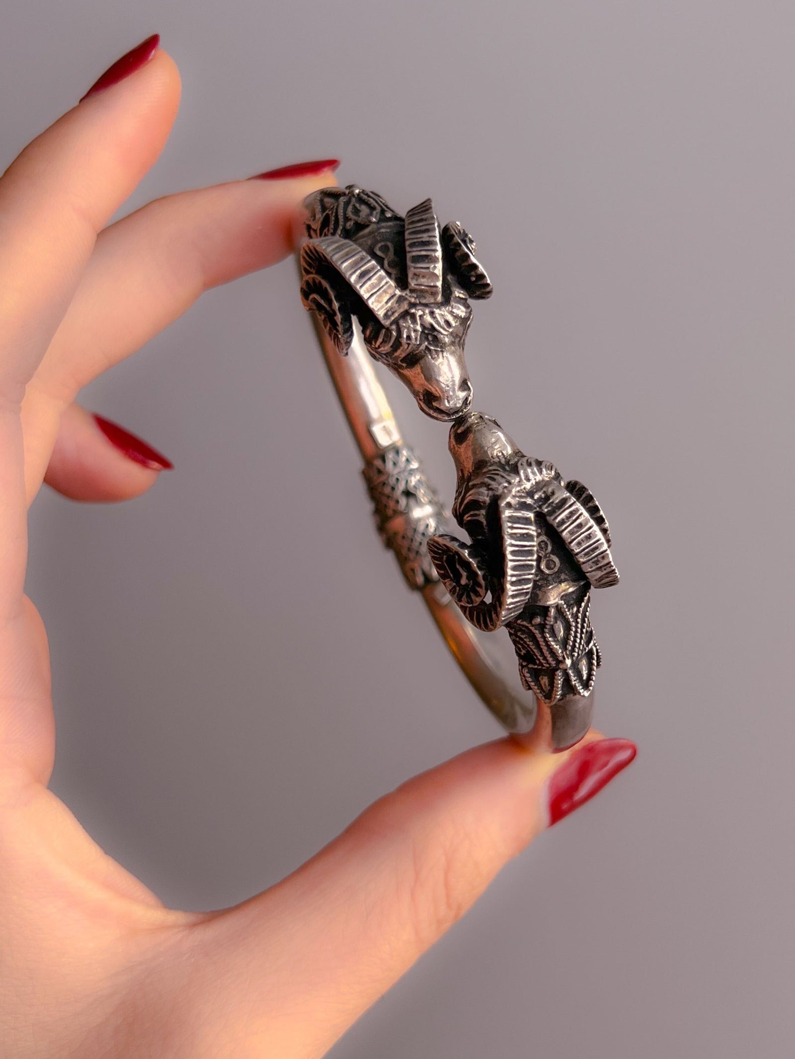 Extremely rare sterling silver ram torque bracelet with sculpted animal head terminals