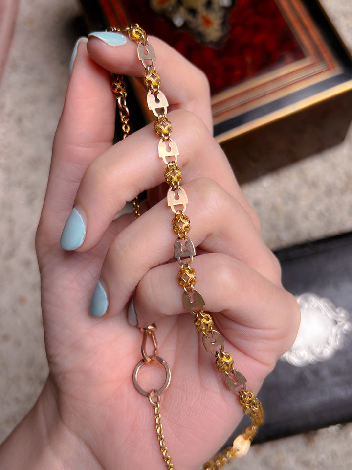 Extremely Rare Padlock Interlocked Chain with Infinity Knots