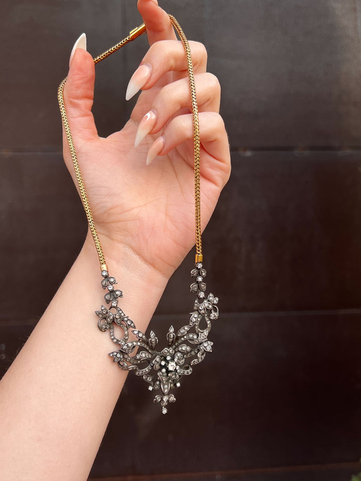 French 18ct gold garland necklace with rose-cut diamonds and tremblant floral center, Belle Époque elegance