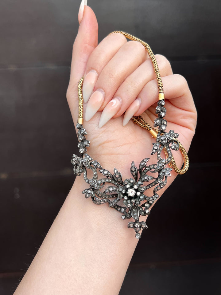 French 18ct gold garland necklace with rose-cut diamonds and tremblant floral center, Belle Époque elegance