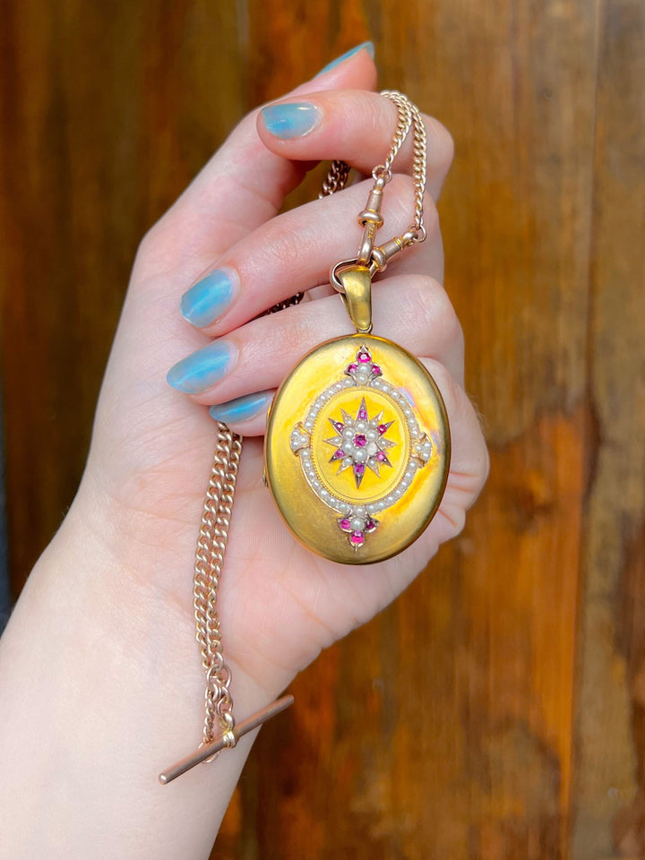 Superb 15k Ruby and Pearl Locket