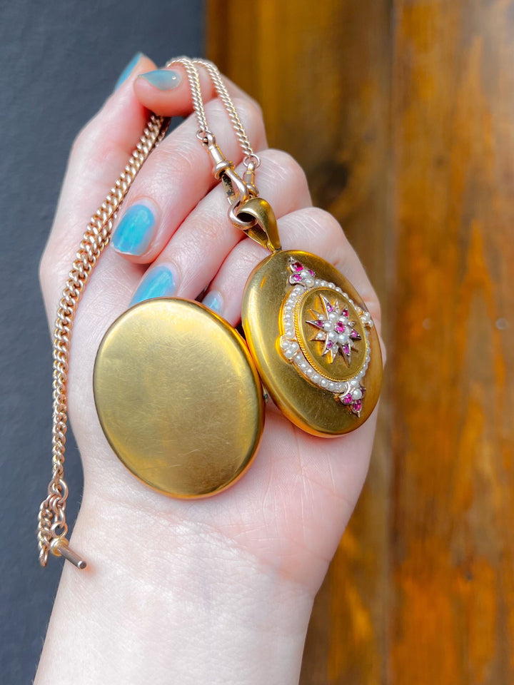 Superb 15k Ruby and Pearl Locket