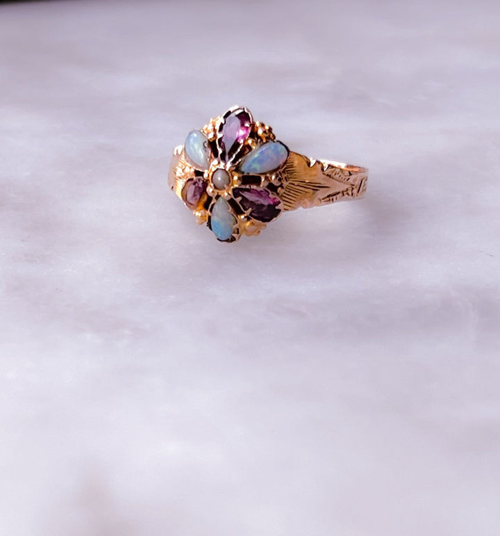Delicious Almadine Garnet and Opal Forget-Me-Not Ring