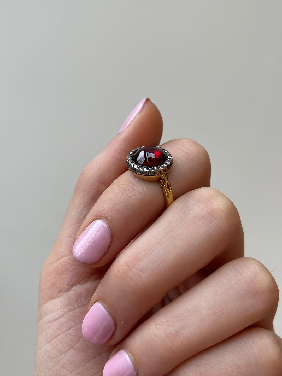 Outstanding Foiled Garnet Ring with Rose-Cut Halo