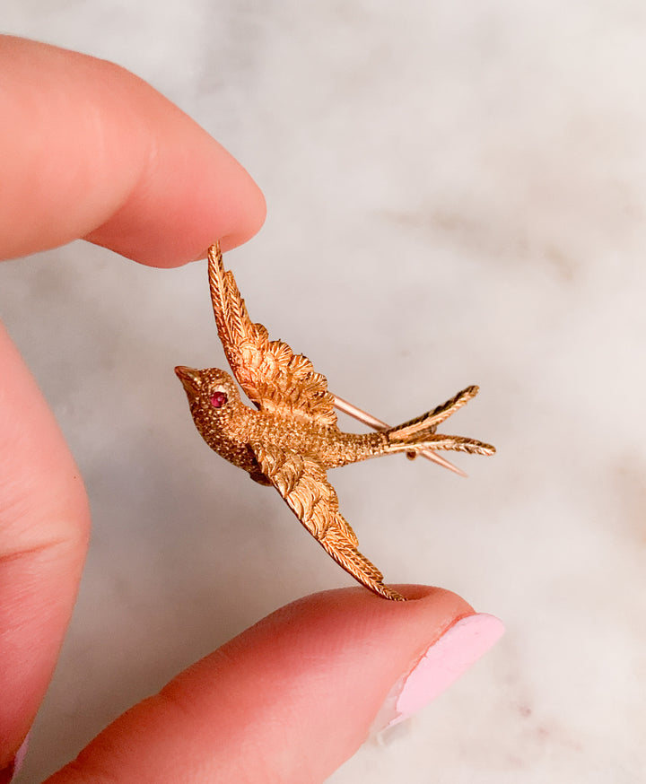 Stunning Swallow Brooch in 15k with a Ruby Eye *include green ribbon*