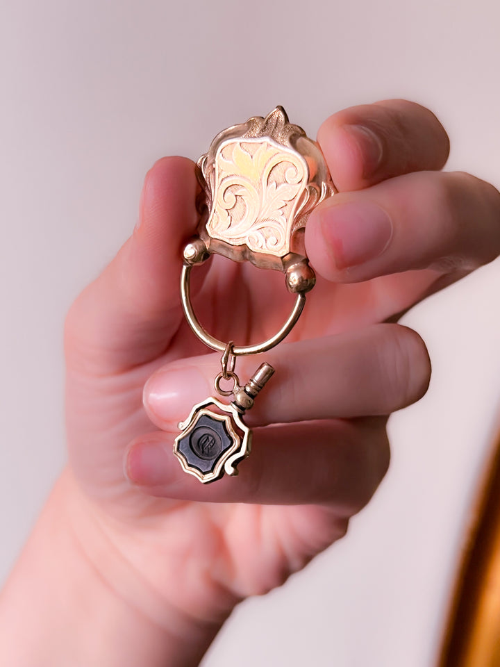 Delicious Onyx Watch Key in 9k