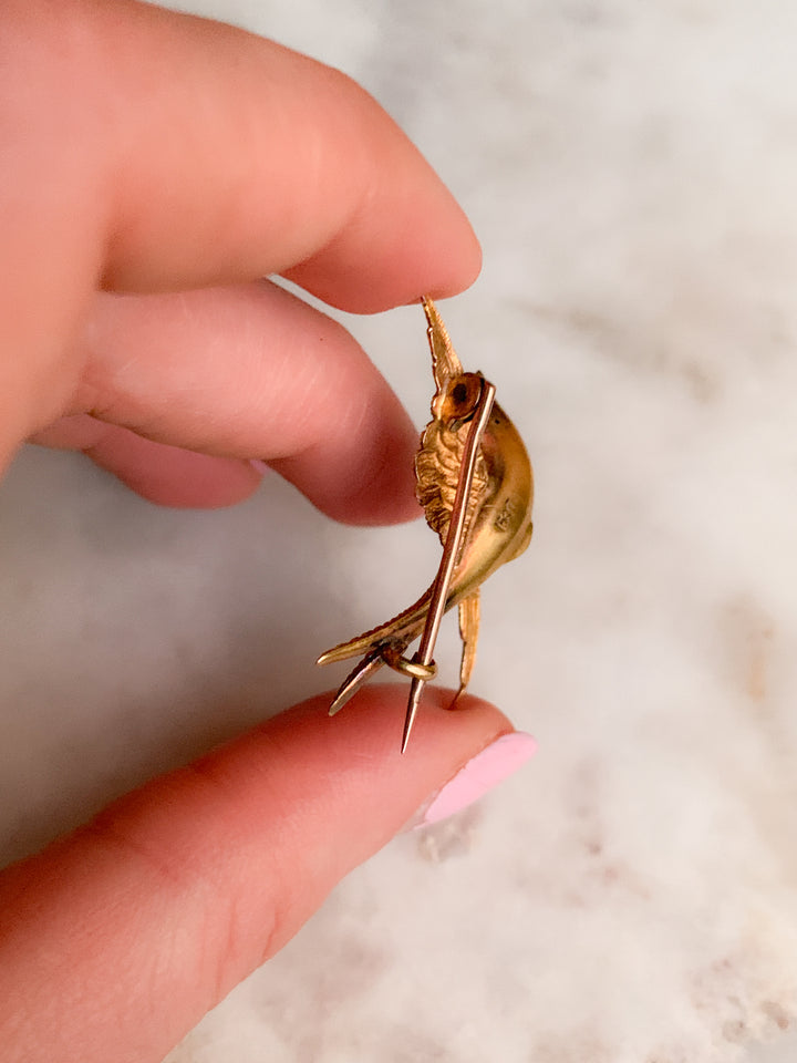 Stunning Swallow Brooch in 15k with a Ruby Eye *include green ribbon*